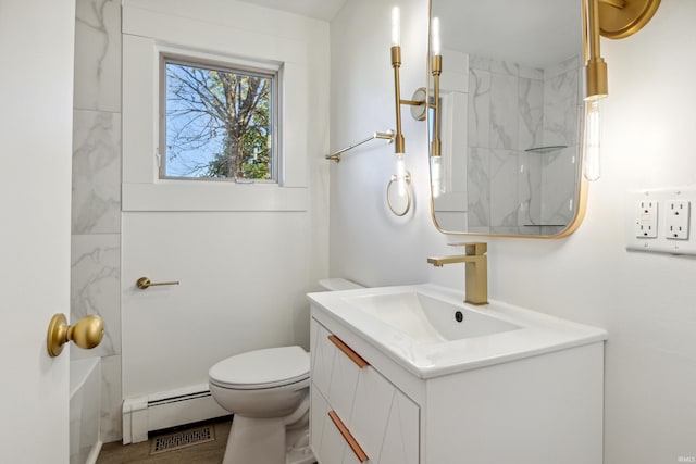 bathroom with walk in shower, vanity, toilet, and baseboard heating