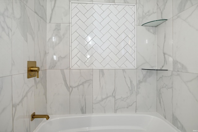 bathroom with a bathtub and a shower
