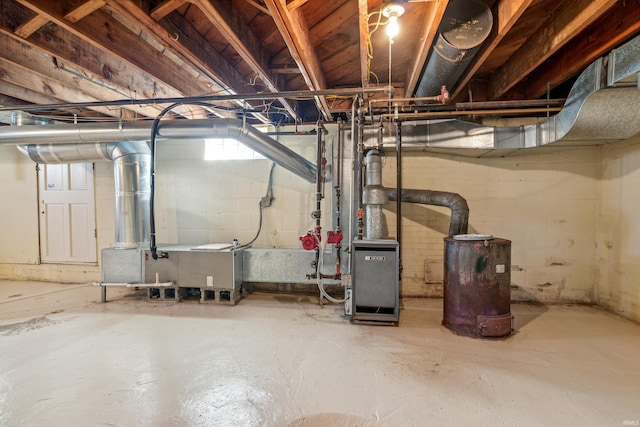unfinished basement with a heating unit