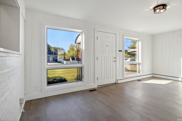 entryway with visible vents and wood finished floors