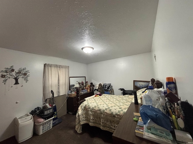 carpeted bedroom featuring a textured ceiling