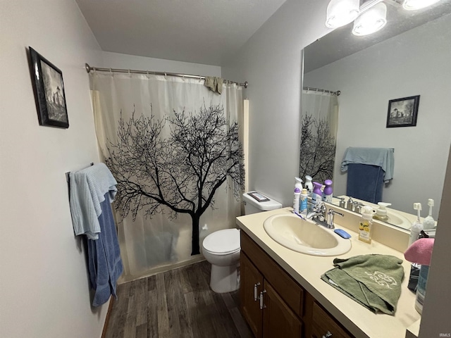 full bathroom featuring vanity, toilet, wood finished floors, and a shower with shower curtain