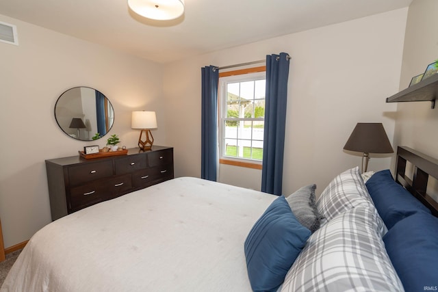 bedroom featuring baseboards