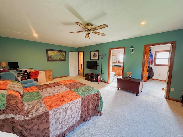 bedroom featuring recessed lighting, carpet, baseboards, and a spacious closet