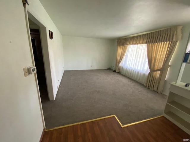 8441 E County Road 650 S, Selma, IN 47383 - empty room featuring wood finished floors