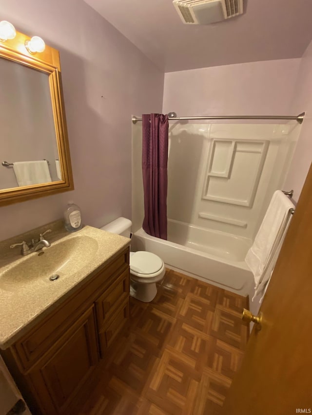 8441 E County Road 650 S, Selma, IN 47383 - bathroom with vanity, toilet, visible vents, and shower / tub combo with curtain