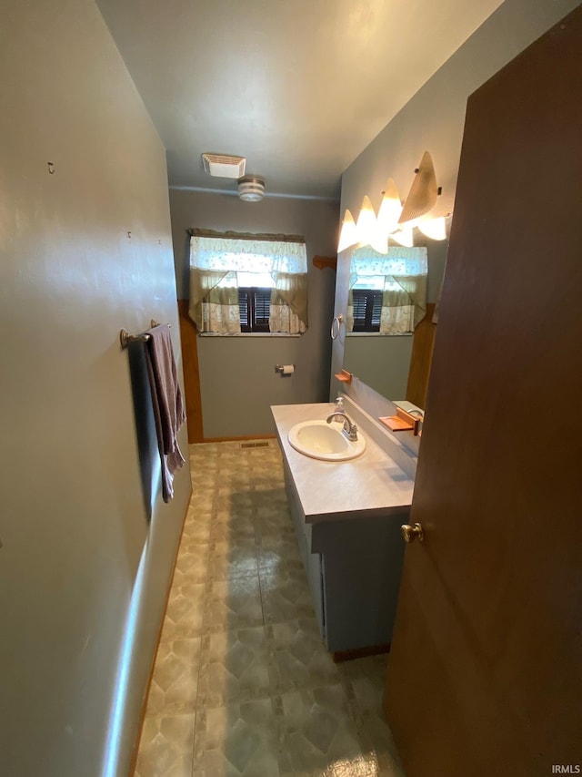 8441 E County Road 650 S, Selma, IN 47383 - bathroom with vanity and tile patterned floors
