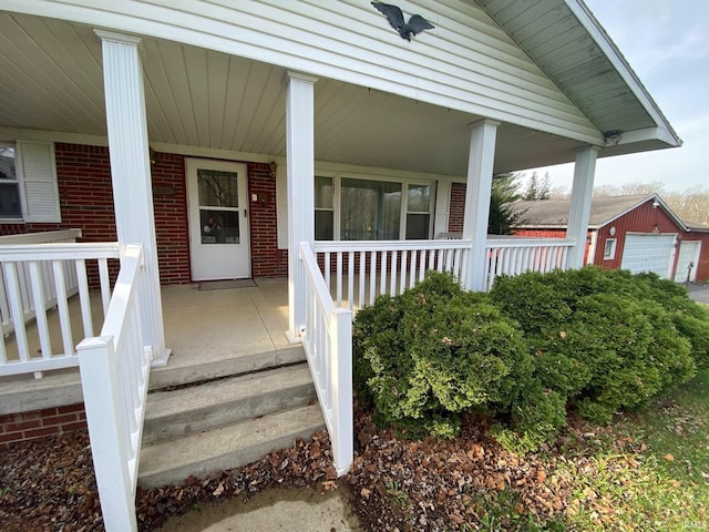 8441 E County Road 650 S, Selma, IN 47383 - property entrance with covered porch and brick siding