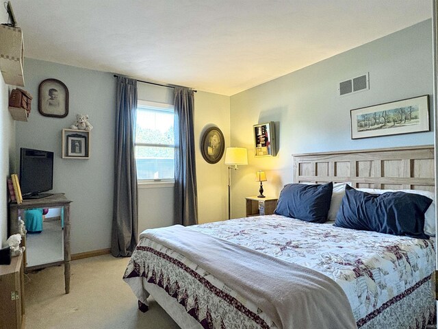 2306 Carmel Dr, West Lafayette, IN 47906 - bedroom featuring carpet floors, baseboards, and visible vents