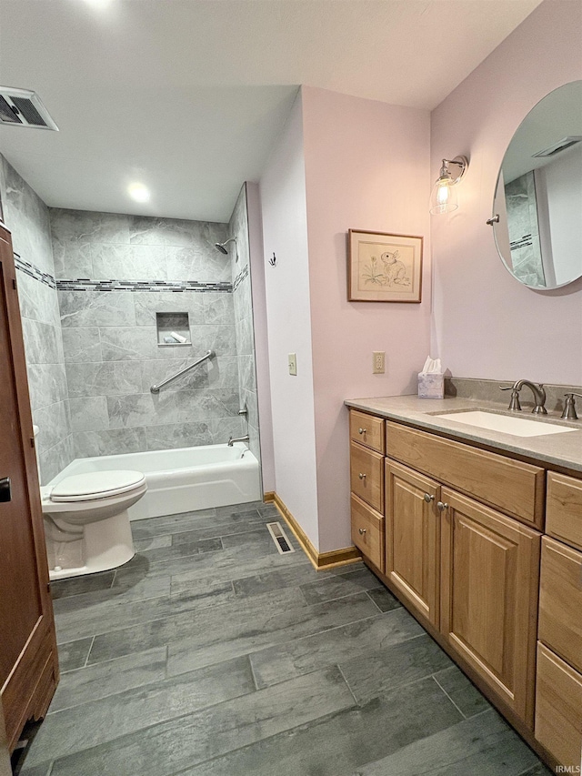 2306 Carmel Dr, West Lafayette, IN 47906 - full bathroom featuring toilet,  shower combination, visible vents, and vanity