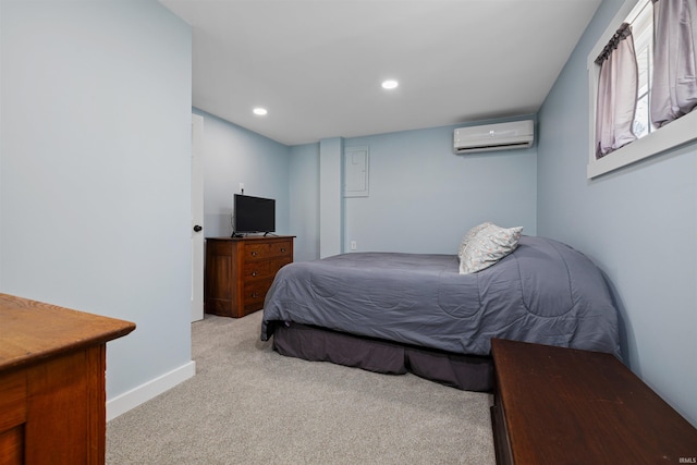 bedroom featuring recessed lighting, baseboards, a wall mounted AC, and light carpet