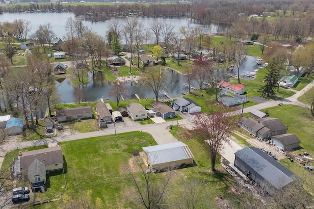 aerial view featuring a residential view and a water view
