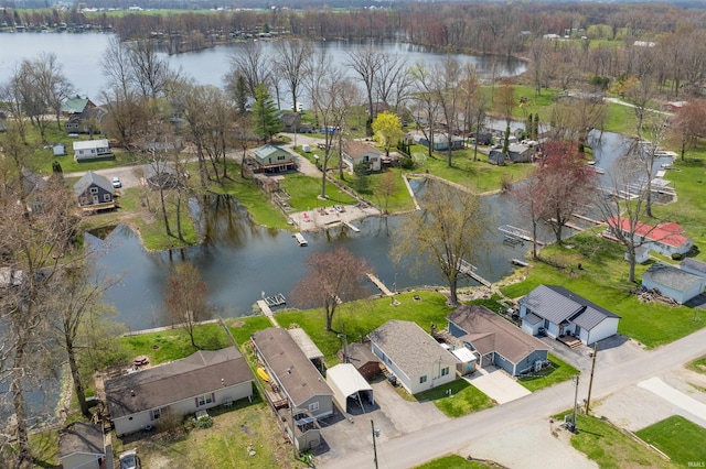 bird's eye view with a water view and a residential view