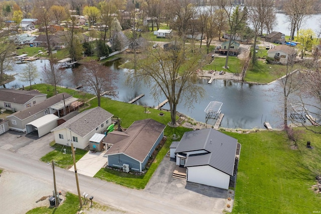 aerial view featuring a water view and a residential view