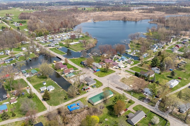 birds eye view of property featuring a residential view and a water view