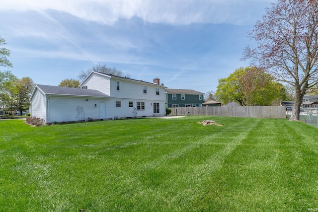view of yard with fence