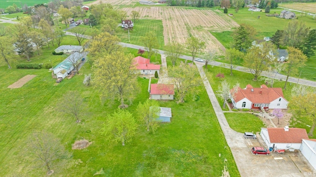 birds eye view of property featuring a rural view