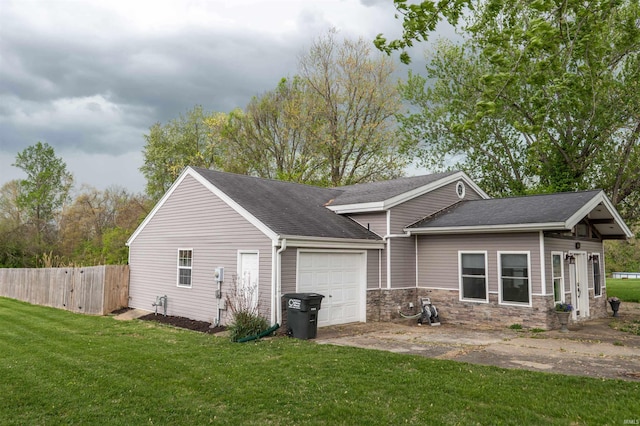 2200 33rd St, Bedford, IN 47421 - view of side of property with driveway, roof with shingles, a garage, fence, and a yard
