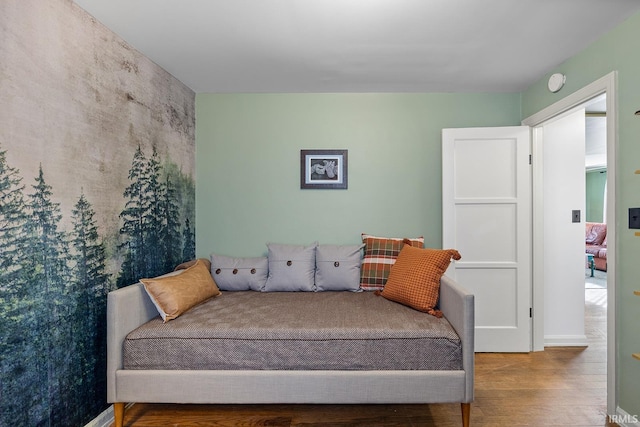 bedroom featuring wood finished floors