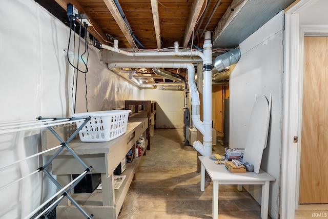 unfinished basement featuring wood finished floors