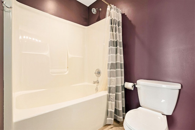 full bath featuring toilet and shower / tub combo