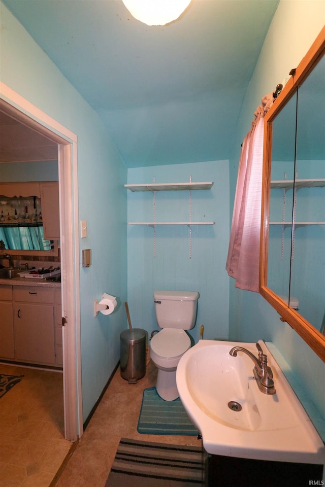161 Orange Ave, Dunkirk, IN 47336 - bathroom with vanity, lofted ceiling, and toilet