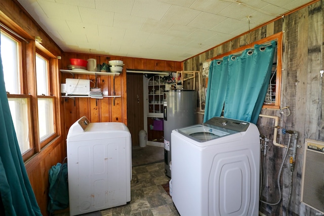 161 Orange Ave, Dunkirk, IN 47336 - laundry room featuring laundry area, wood walls, washing machine and dryer, and electric water heater