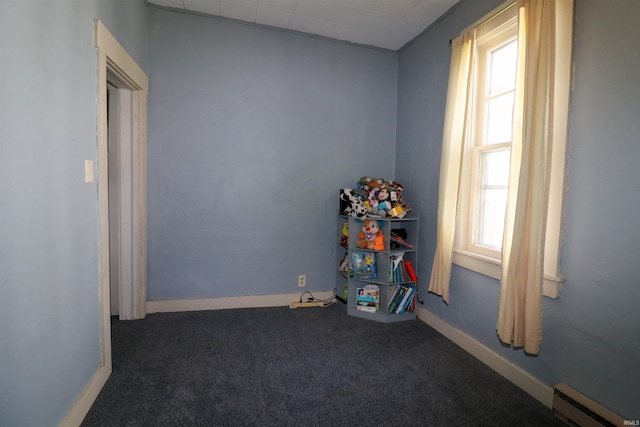 161 Orange Ave, Dunkirk, IN 47336 - rec room featuring carpet, baseboards, and baseboard heating