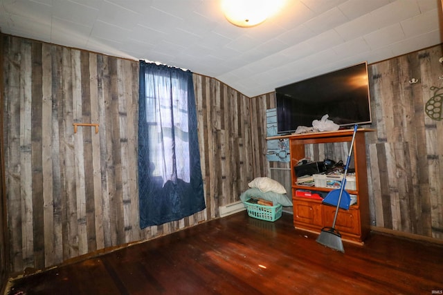 161 Orange Ave, Dunkirk, IN 47336 - bedroom featuring wooden walls, baseboard heating, vaulted ceiling, and wood finished floors