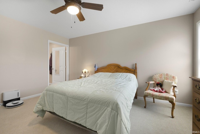 bedroom featuring baseboards, carpet, and ceiling fan