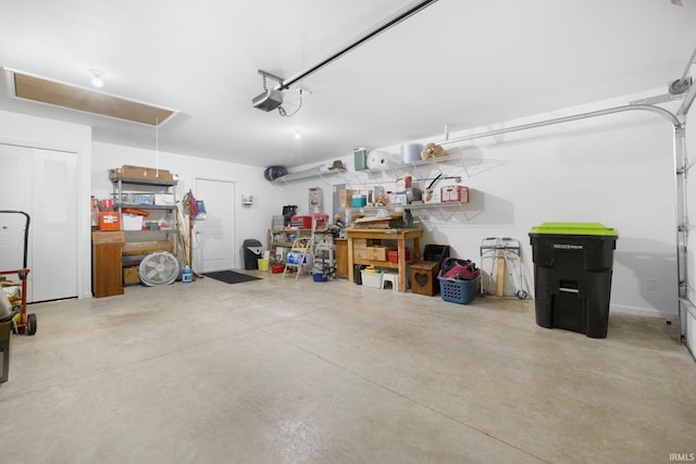 garage featuring a garage door opener