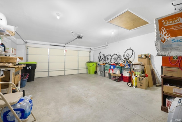 garage featuring a garage door opener