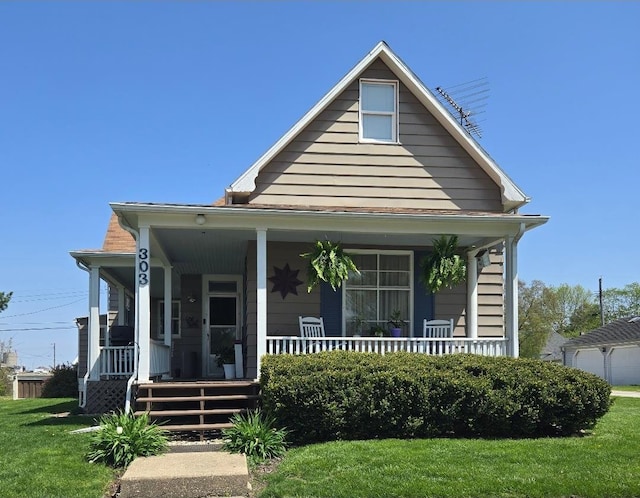 bungalow-style house with covered porch and a front yard