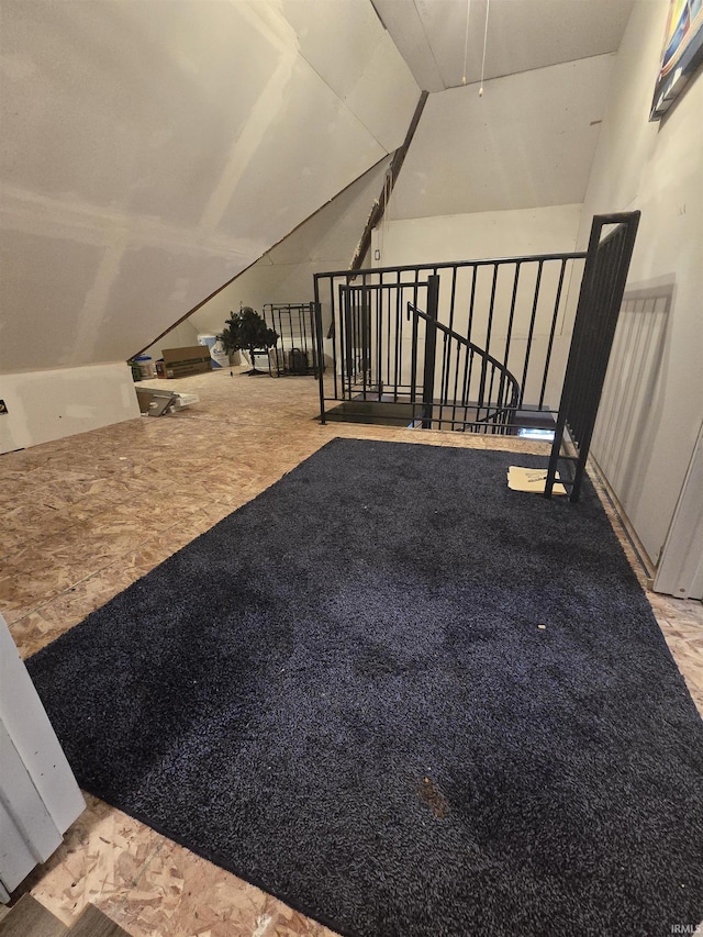 additional living space with lofted ceiling