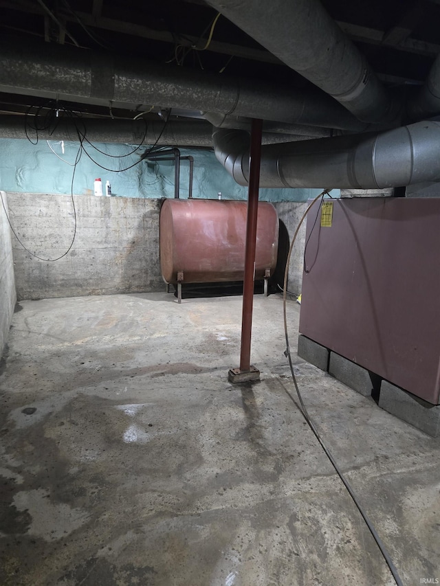 unfinished basement with heating fuel