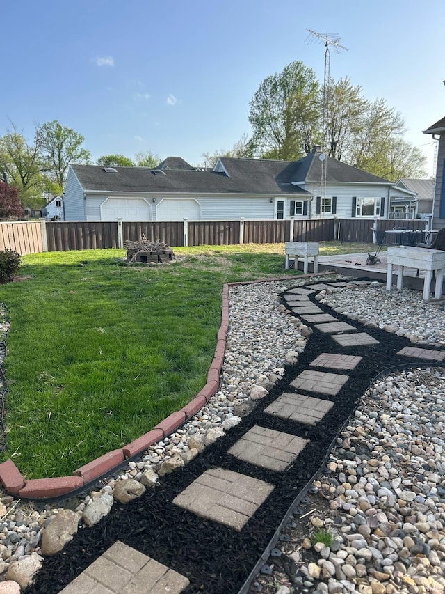 view of yard featuring fence