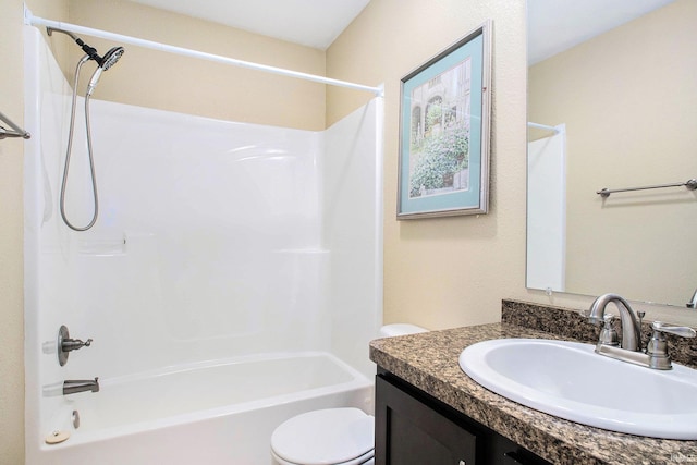 full bath with vanity, toilet, and bathtub / shower combination