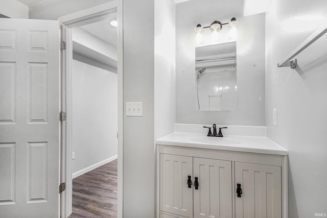 bathroom featuring vanity and wood finished floors