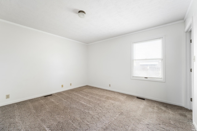 208 E Hickory Grove Rd, Hartford City, IN 47348 - empty room with visible vents, ornamental molding, and carpet flooring