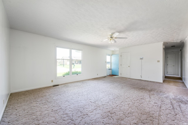 208 E Hickory Grove Rd, Hartford City, IN 47348 - interior space featuring baseboards, a ceiling fan, and a textured ceiling