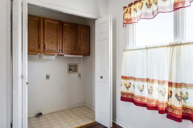 208 E Hickory Grove Rd, Hartford City, IN 47348 - laundry area featuring washer hookup, hookup for an electric dryer, cabinet space, baseboards, and tile patterned floors