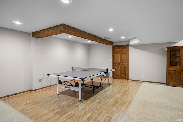 rec room featuring recessed lighting, baseboards, and light wood finished floors