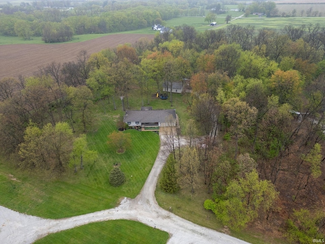 birds eye view of property with a rural view