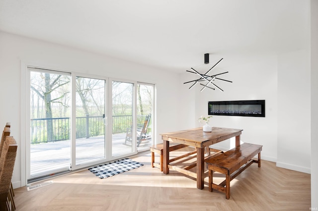 13440 N Summerhill Dr, Albany, IN 47320 - dining space with baseboards, visible vents, and a chandelier
