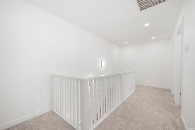 13440 N Summerhill Dr, Albany, IN 47320 - hallway featuring carpet floors, baseboards, recessed lighting, and visible vents