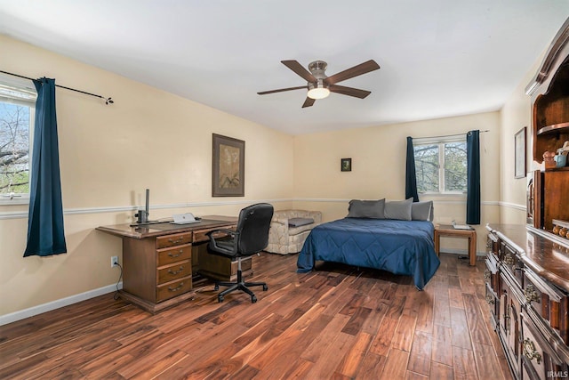 bedroom featuring dark wood-type flooring, baseboards, and ceiling fan