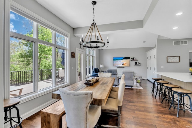 dining room featuring visible vents, recessed lighting, a notable chandelier, and dark wood-style floors