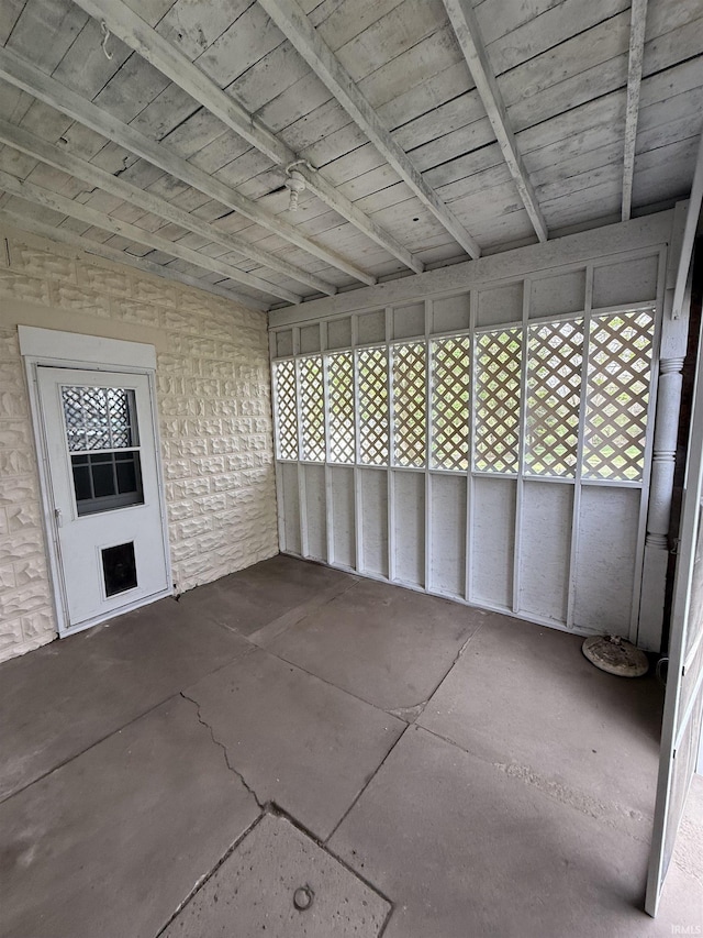 unfurnished sunroom with a wealth of natural light