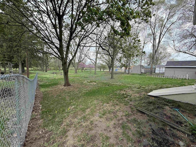 view of yard with fence
