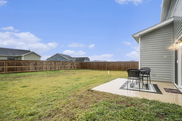 view of yard featuring a fenced backyard and a patio